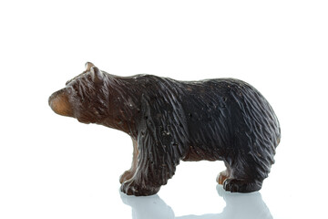 beautiful figurine of a bear made of smoky quartz on a white background