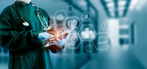 Fototapeta premium Medicine doctor touching on digital tablet and hologram modern virtual screen interface icons, Medical technology and futuristic concept.