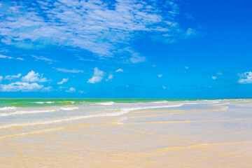Obraz premium Beautiful Holbox island beach sandbank panorama turquoise water waves Mexico.