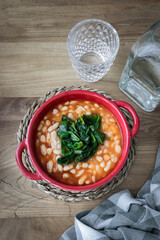 White beans stew with vegetables. Vegetal protein. Vegetarian diet. Food photography