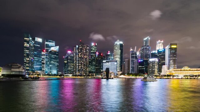 Time-lapse of skyscraper tower buildings in financial business district at Marina bay Singapore city. Enterprise business, corporate organization, Asia travel landmark, or Asian city life concept