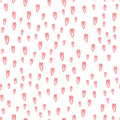 Seamless pattern with hand-drawn pink doodle hearts on white background