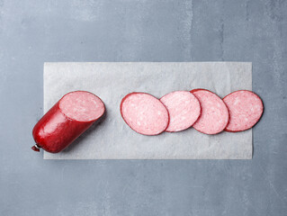 salami on a gray background