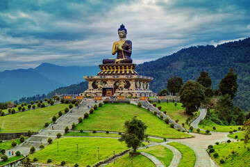 Beautiful huge statue of Lord Buddha, at Rabangla , Sikkim , India. Surrounded by Himalayan Mountains it is called Buddha Park - a popular tourist attraction.