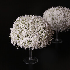 Flower arrangement on a vase martinka. Like a cloud of gypsophila flowers for interior decoration....
