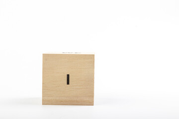 Wooden cubes with the inscription i on a white background