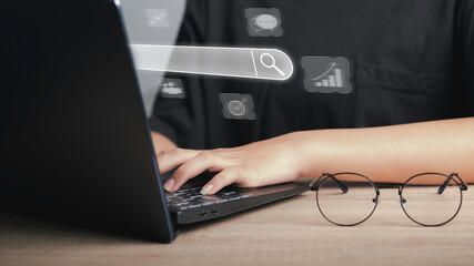 Search Engine Optimization (SEO) concept. Businessman user laptop to search engine tool. Find...