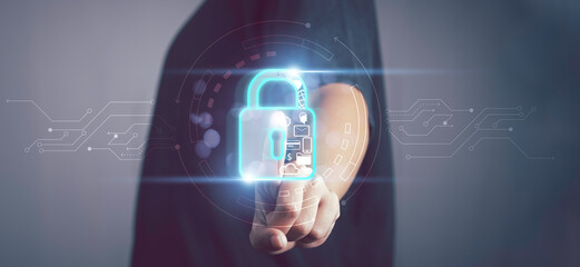 Cybersecurity, privacy, data protection concept. Hand touch Lock icon on modern screen computer network security and financial data with virtual connection, cyber attack privacy business data.