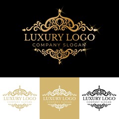 Golden calligraphic floral hand drawn monogram antique vintage style luxury logo design