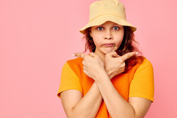 cheerful woman in yellow hat fashion posing emotions isolated backgrounds unaltered