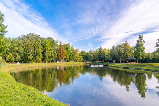 Autumn view on pond in millennium park in Chojnice, Poland.