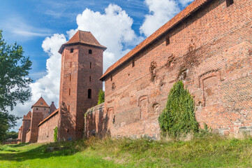 Teutonic Knights in Malbork castle in summer. World Heritage list UNESCO.