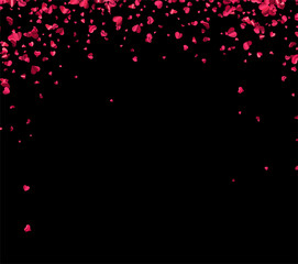 Pink falling hearts confetti on black background with space for text.
