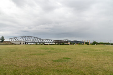 Fototapeta na wymiar Old bridges over Vistula river at cloudy day in Tczew in Poland.
