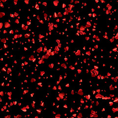 Fototapeta na wymiar Red hearts confetti on black background.