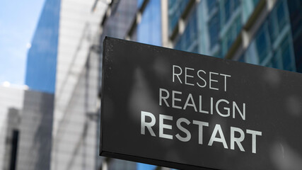 Reset Realign Restart on a black city-center sign in front of a modern office building	
 - obrazy, fototapety, plakaty