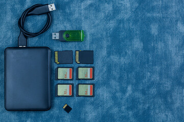 Modern digital devices for the transfer and storage of information. Flash drives, external hard...