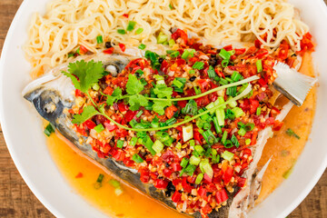 Steamed fish head with diced hot red peppers