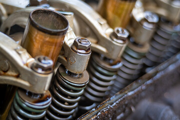 Obraz na płótnie Canvas Close up Arm valve rocker of Single Over Head Camshaft engine.Car maintenance Checking and adjusting valves clearance.