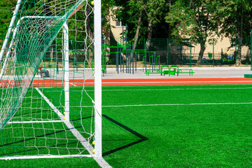 soccer gates. Football goal at the stadium. Football field with artificial lawn. Concept other party of soccer.  At stadium.