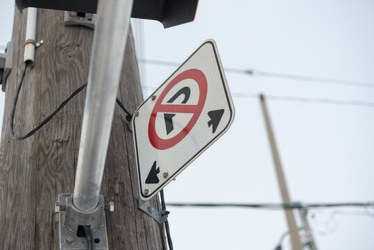 No Parking Sign On A Post In Winter