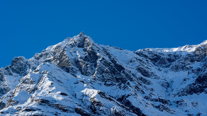 view of the snow capped alps in the hohe tauern national park in salzburg , austria at a sunny clear winter day