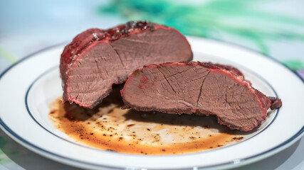 ready to eat - grilled venison meat from a young chamois