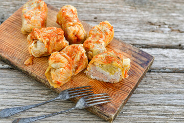 Cabbage rolls with meat, rice and vegetables. Stuffed cabbage leaves with  ground beef. Known as sarma, golubtsy, dolma.
