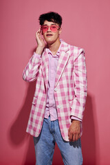 A young man pink shirt and glasses jacket fashion elegant style Lifestyle unaltered