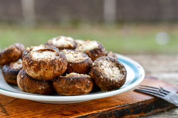  Delicious   Homemade Baked champignon caps stuffed with  beef minced meat and fresh parsley. Ketogenic diet food