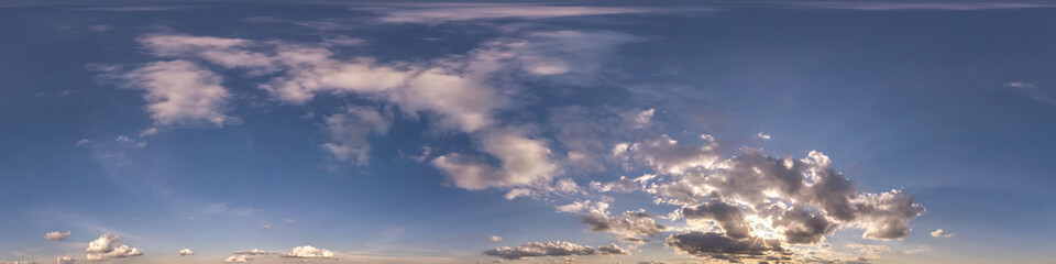 evening blue sky hdr 360 panorama with white beautiful clouds in seamless projection with zenith for use in 3d graphics or game development as sky dome or edit drone shot for sky replacement
