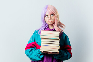 Beautiful yandere girl with purple hair and 80s tracksuit holds book on gray background