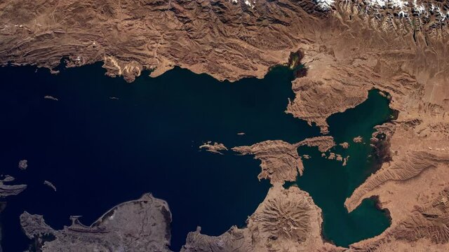 Scenic view of lake and mountains of Titicaca lake south America Peru and Bolivia border, aerial satellite view from space sunrise animation. Image furnished by Nasa