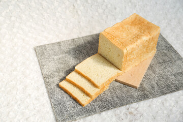 Plain toasted bread whole. White bread toast slice.	
