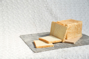Plain toasted bread whole. White bread toast slice.	
