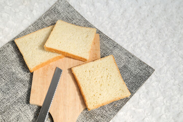 Plain toasted bread whole. White bread toast slice.	
