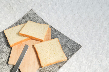 Plain toasted bread whole. White bread toast slice.	
