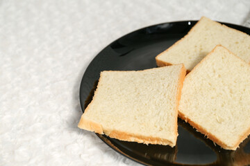 Plain toasted bread whole. White bread toast slice.	
