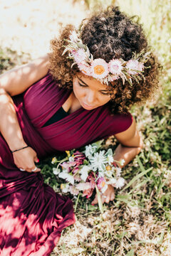 Close Up Of Pink Flower Crown In Women’s Hair During Summer