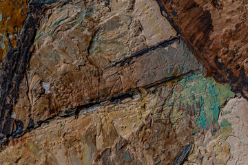 Abstract background closeup of a painting with brushstrokes. Rough art paint smear. Large multicolor spots of brush strokes and palette knife on the canvas