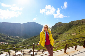 Fototapeta na wymiar woman on Mountain village Masca on Tenerife, Spain. Tenerife landmark landscape