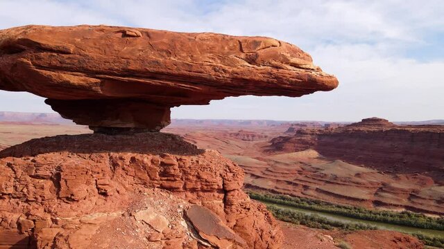 Aerial shot of the amazing balancing rock formation of Mexican Hat in Southern Utah