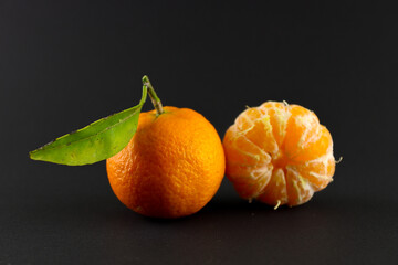 tangerine on black background