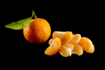 tangerines on black background