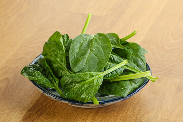 Fresh green spinach leaves in the bowl