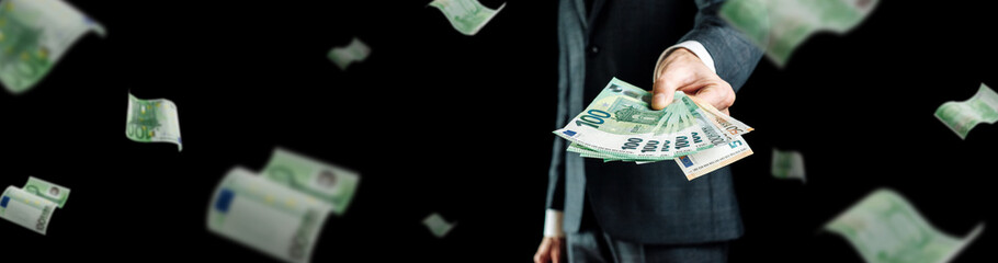 Rich man holding Europe money. Cash Euro bill flying banner. Euro money background.
