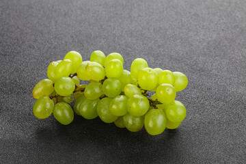 Ripe sweet green grape branch