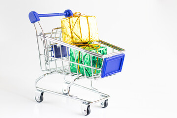 Gift boxes inside the toy shopping trolley.