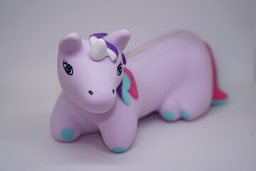 unicorn. pen in the shape of a pink unicorn. product photo.