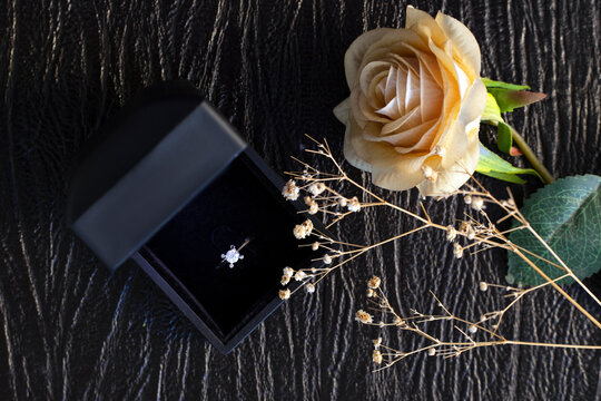 Diamond wedding ring in a black gift box